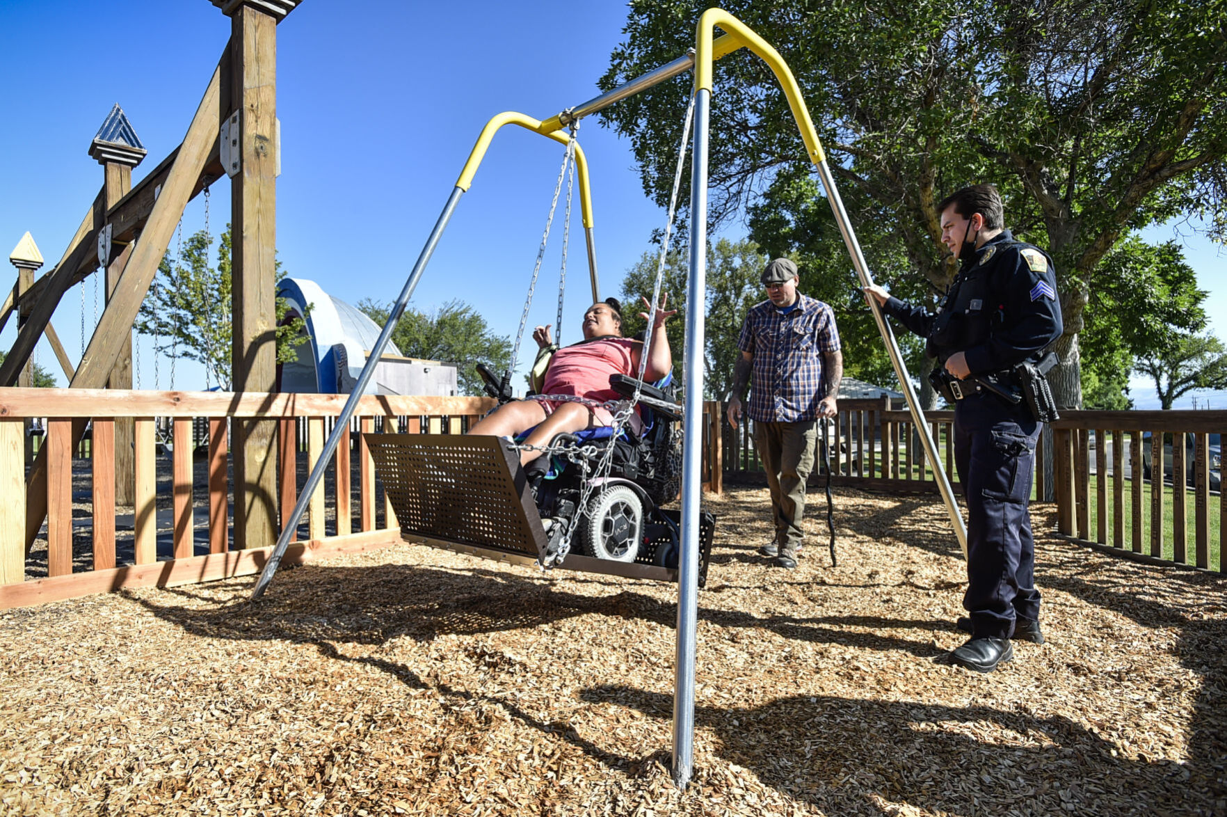 Carrie Jonesgets a push in a new wheel chair capable swing